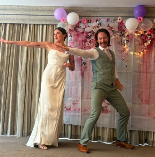 a married couple dancing