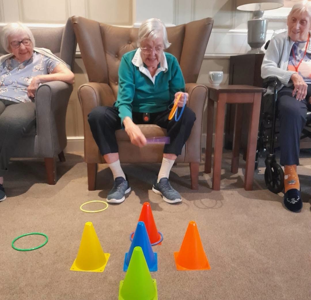 residents playing ring toss game